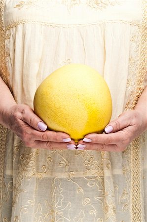 fuzzbones (artist) - Housewife holding an pomelo Stock Photo - Budget Royalty-Free & Subscription, Code: 400-05308085