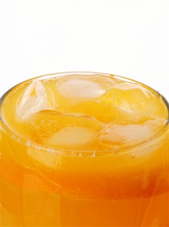 simsearch:400-04823336,k - Orange juice with ice cubes Photographie de stock - Aubaine LD & Abonnement, Code: 400-05308413