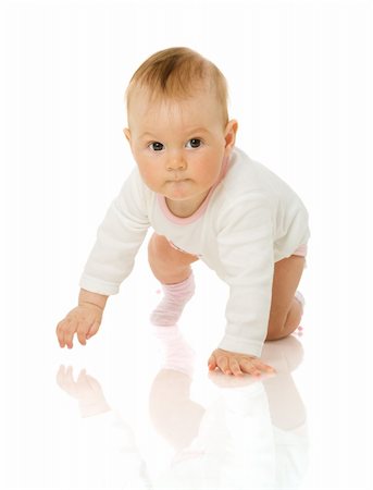 Adorable six month Baby Girl  looking up isolated on white Stockbilder - Microstock & Abonnement, Bildnummer: 400-05308934