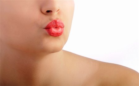 simsearch:400-03954263,k - Sexy puckered woman's lips, over white background Photographie de stock - Aubaine LD & Abonnement, Code: 400-05309097