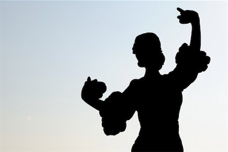 pictures of the traditional dance in spain - Silhouette of a Spanish dancer when clapping the castanets against the ligth Stock Photo - Budget Royalty-Free & Subscription, Code: 400-05309148