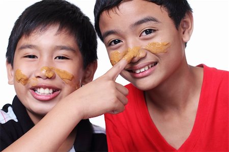 image of young boys with smeared faces Stockbilder - Microstock & Abonnement, Bildnummer: 400-05309334
