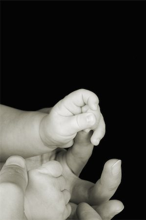 simsearch:400-04235194,k - Hands of caucasian mother and baby, baby holding mother's finger Stock Photo - Budget Royalty-Free & Subscription, Code: 400-05309744