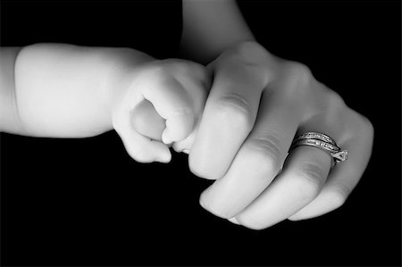 simsearch:400-04235194,k - Caucasian mother and baby, baby holding mother's thumb Stock Photo - Budget Royalty-Free & Subscription, Code: 400-05309746