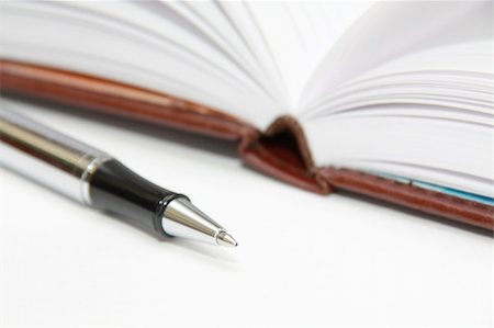 simsearch:400-05381119,k - Closeup pen against diary book Stock Photo - Budget Royalty-Free & Subscription, Code: 400-05309826