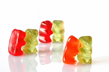 sweet gummy bears dancing on a party on white background Stock Photo - Budget Royalty-Free & Subscription, Code: 400-05300106