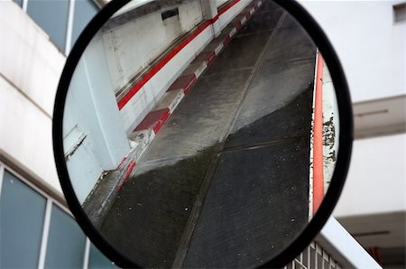 Parking driveway mirrored on convex curved mirror. Stock Photo - Budget Royalty-Free & Subscription, Code: 400-05300187