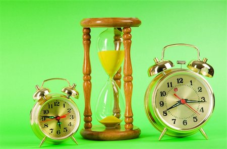 Time concept with clock and hour glass Stock Photo - Budget Royalty-Free & Subscription, Code: 400-05300442