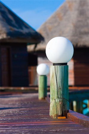 Lantern on the pier of tropical island of Maldives Stock Photo - Budget Royalty-Free & Subscription, Code: 400-05300499