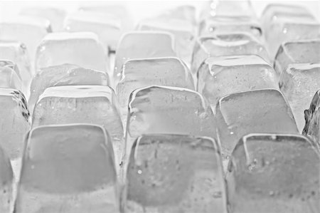 Melted Ice cubes on the white. Horizontal. Fotografie stock - Microstock e Abbonamento, Codice: 400-05300813