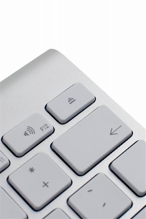 simsearch:400-04698351,k - Closeup of a modern aluminium keyboard, focus on the eject key. Stock Photo - Budget Royalty-Free & Subscription, Code: 400-05301116