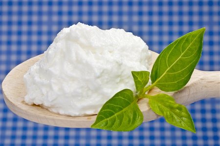 soft cheese cream - gout cream cheese on a spoon with basil Stock Photo - Budget Royalty-Free & Subscription, Code: 400-05301506