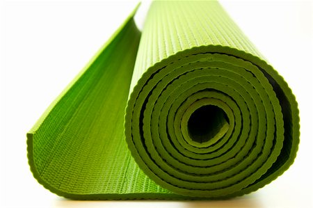 Green yoga mattress isolated on white background Photographie de stock - Aubaine LD & Abonnement, Code: 400-05301543