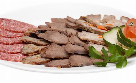 simsearch:400-04745282,k - Smoked meat and sausage in cutting on plate with verdure Stock Photo - Budget Royalty-Free & Subscription, Code: 400-05301594