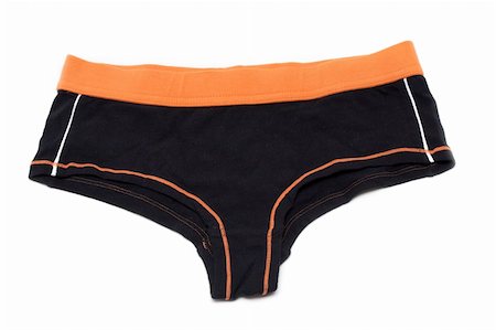 simsearch:400-05298095,k - Feminine underclothes, black panties and orange band Photographie de stock - Aubaine LD & Abonnement, Code: 400-05301592