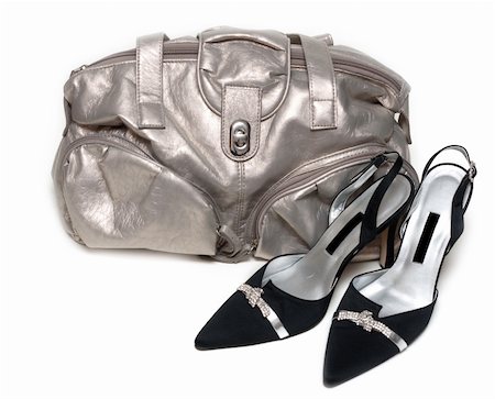 simsearch:400-04834360,k - Silvery feminine leather bag and pair of the loafer on white background Fotografie stock - Microstock e Abbonamento, Codice: 400-05301628