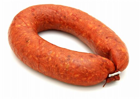 simsearch:400-05273014,k - Tasty sausage is curtailed by a ring lies on a white background Fotografie stock - Microstock e Abbonamento, Codice: 400-05301841