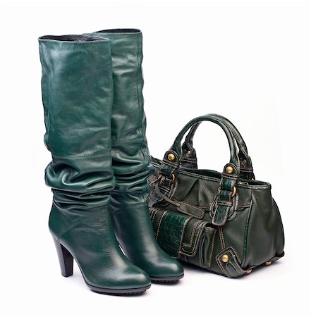 simsearch:400-05045228,k - Green female high-heeled boots and leather bag on white background Photographie de stock - Aubaine LD & Abonnement, Code: 400-05301977