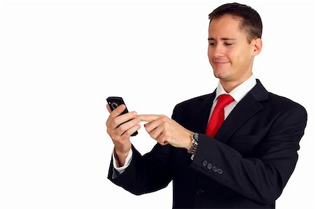 Handsome young man in a suit navigating on his smartphone with his finger on the touchscreen Stock Photo - Budget Royalty-Free & Subscription, Code: 400-05302331