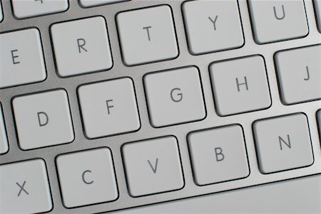 simsearch:400-04698351,k - Closeup of a modern aluminum keyboard, focus on center keys. Stock Photo - Budget Royalty-Free & Subscription, Code: 400-05302706