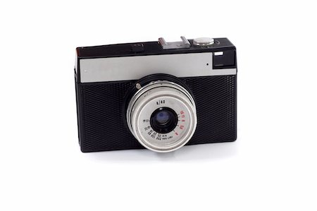 simsearch:400-04729186,k - Old analog camera photo on the white background Photographie de stock - Aubaine LD & Abonnement, Code: 400-05302748