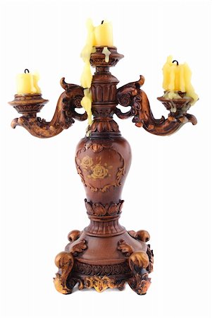 simsearch:614-01561575,k - Wooden carved candlestick on three yellow candles Stock Photo - Budget Royalty-Free & Subscription, Code: 400-05303878