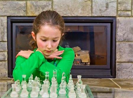 simsearch:640-01351370,k - Young girl making some quick decisions during the game Stock Photo - Budget Royalty-Free & Subscription, Code: 400-05303909