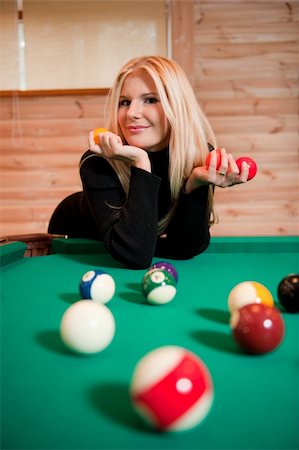 pretty female playing billiard Stock Photo - Budget Royalty-Free & Subscription, Code: 400-05314006