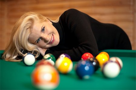 pretty female playing billiard Stock Photo - Budget Royalty-Free & Subscription, Code: 400-05314007