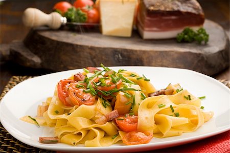 photo of delicious pasta with bacon and tomatoes Stock Photo - Budget Royalty-Free & Subscription, Code: 400-05314041