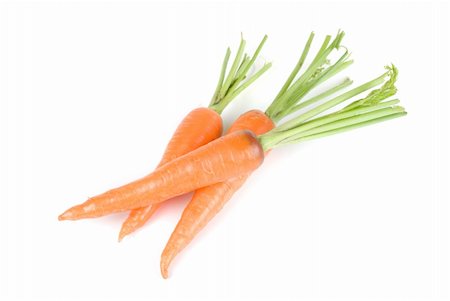 simsearch:400-04812261,k - Ripe carrots isolated on a white background Photographie de stock - Aubaine LD & Abonnement, Code: 400-05314075