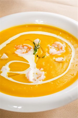 simsearch:400-07298426,k - fresh pumpkin and shrimps cream soup ,with milk cream on top Stock Photo - Budget Royalty-Free & Subscription, Code: 400-05314299