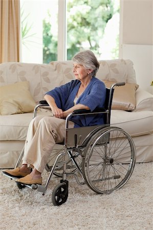 simsearch:400-04327098,k - Retired woman in her wheelchair at home Stock Photo - Budget Royalty-Free & Subscription, Code: 400-05314305