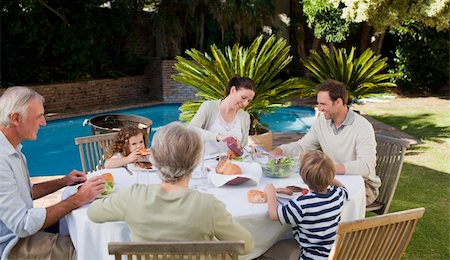 family cheese - Family eating in the garden Stock Photo - Budget Royalty-Free & Subscription, Code: 400-05314514