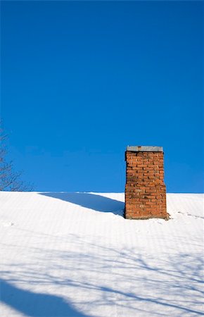 snow covered rooftops - Snowy roof and red brick chimney in background of blue sky Stock Photo - Budget Royalty-Free & Subscription, Code: 400-05314537