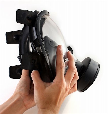 simsearch:400-08077627,k - Holding a black gas mask in hands Stock Photo - Budget Royalty-Free & Subscription, Code: 400-05314589