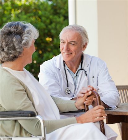 senior rehab - Senior doctor talking with his mature patient Stock Photo - Budget Royalty-Free & Subscription, Code: 400-05314754