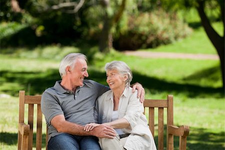 Senior couple sitting on a bench Stock Photo - Budget Royalty-Free & Subscription, Code: 400-05314986