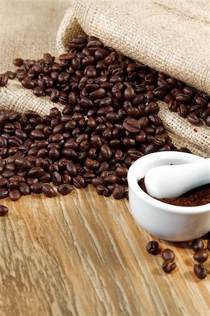 Coffee beans spilling from a burlap sack and fresh coffee Stock Photo - Budget Royalty-Free & Subscription, Code: 400-05315047
