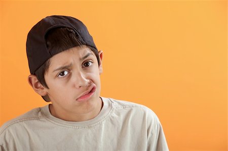 Latino kid making funny faces with his mouth Stock Photo - Budget Royalty-Free & Subscription, Code: 400-05315170