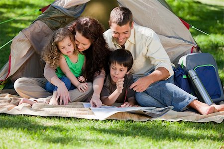 father son camping woods - Joyful family camping Stock Photo - Budget Royalty-Free & Subscription, Code: 400-05315246