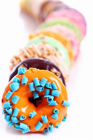 simsearch:400-04178778,k - Colorful and tasty donuts on white background Foto de stock - Super Valor sin royalties y Suscripción, Código: 400-05315577