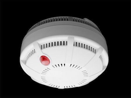 dangerous curve - Smoke and fire detector part of fire alarm system isolated on black Stock Photo - Budget Royalty-Free & Subscription, Code: 400-05315845