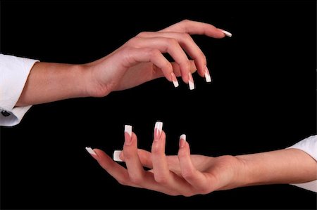 simsearch:400-05197765,k - Human fingers with long fingernail and beautiful manicure isolated on black Photographie de stock - Aubaine LD & Abonnement, Code: 400-05315993