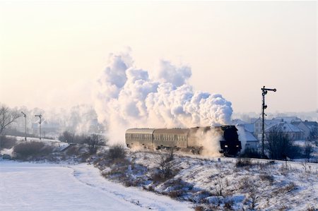 simsearch:862-03288971,k - Vintage steam train passing through snowy countryside Stock Photo - Budget Royalty-Free & Subscription, Code: 400-05316037