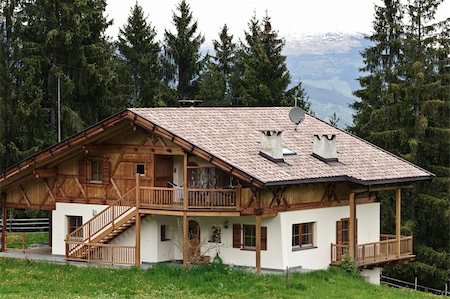 Traditional wooden House with Forest in Tyrol, Austria Stock Photo - Budget Royalty-Free & Subscription, Code: 400-05316206