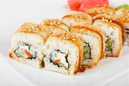 simsearch:400-05119569,k - Sushi rolls at plate isolated on a white Stockbilder - Microstock & Abonnement, Bildnummer: 400-05316538