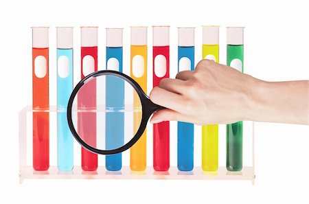 simsearch:400-04522609,k - Various glass test tubes in holder and hand with magnifier isolated on the white background Stock Photo - Budget Royalty-Free & Subscription, Code: 400-05316622
