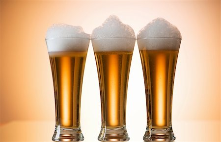 simsearch:695-05774838,k - Beer glasses against the colorful gradient background Stock Photo - Budget Royalty-Free & Subscription, Code: 400-05316904