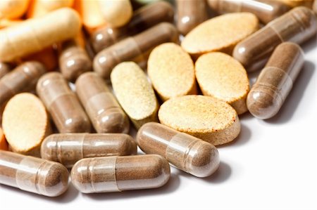 Medicinal pills piled up a bunch of closeup Stock Photo - Budget Royalty-Free & Subscription, Code: 400-05317117